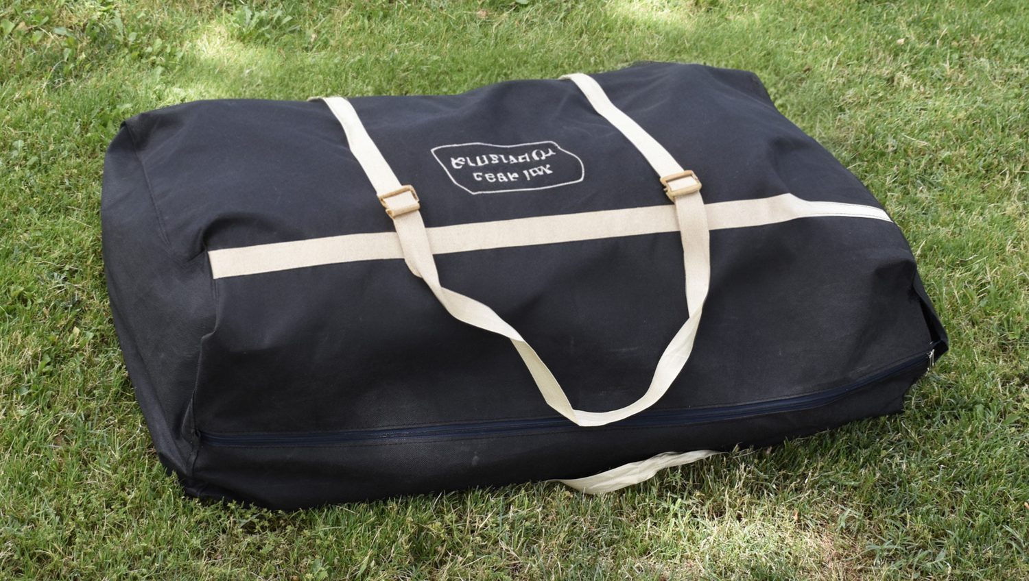 Plat4tent folded into its carry bag